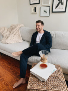 Full image of man on a couch, self timer