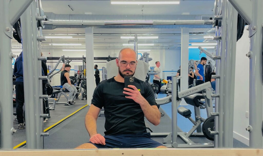 selfie of a man in the gym, mirror pic