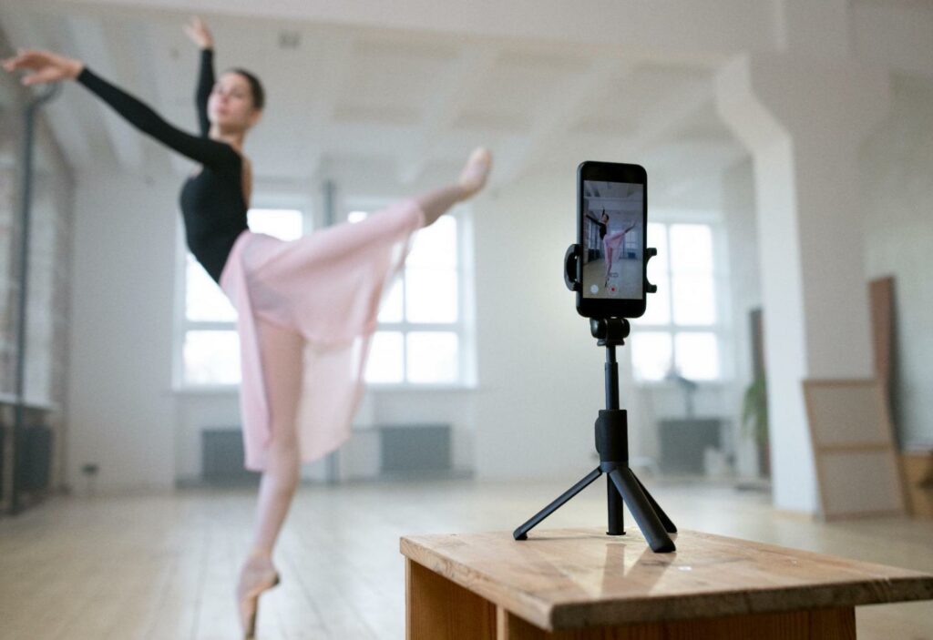 dancing ballerina filming on tripod