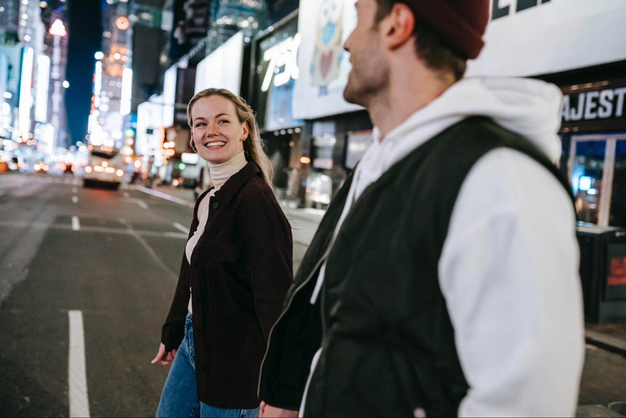 happy daters walking down NYC streets