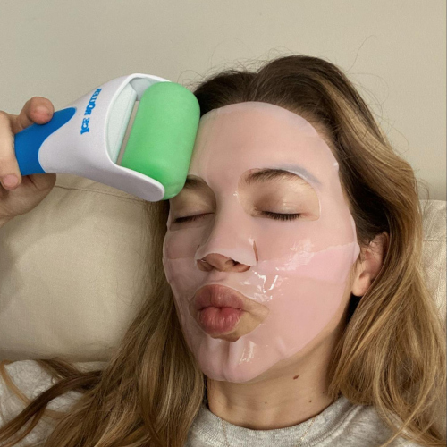 girl doing skincare, taking a selfie for dating apps