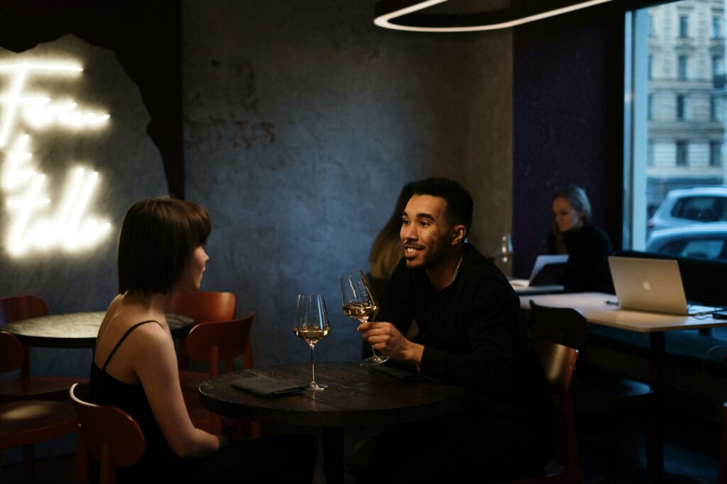 toasting with wine in a restaurant
