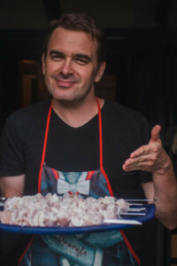 50 year old man preparing bbq, good dating profile photo example