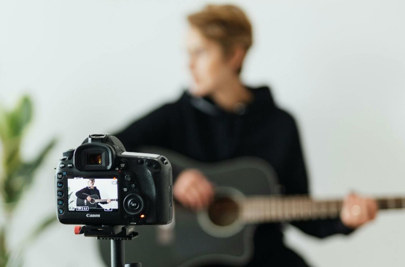 man taking selfie, with tripod