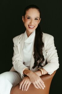woman in white, black background, business photo test