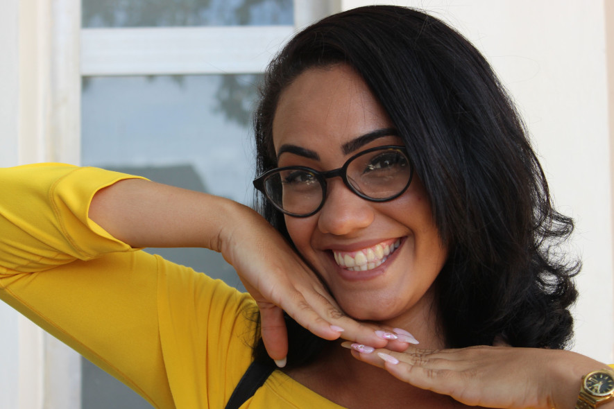 woman smiling with glasses